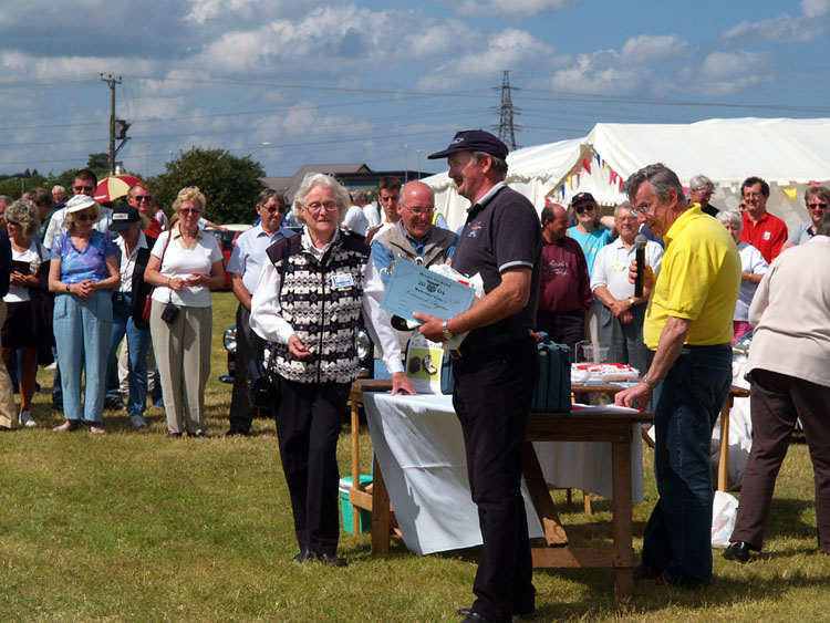 CHRIS PARKER RECEIVING TROPHY FROM MARGOT HEALEY